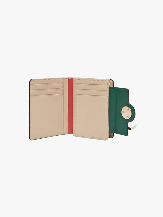Green and beige wallet with a red stripe on a white background