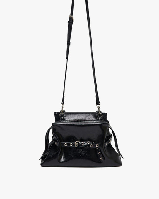 Black handbag with a strap on a white background